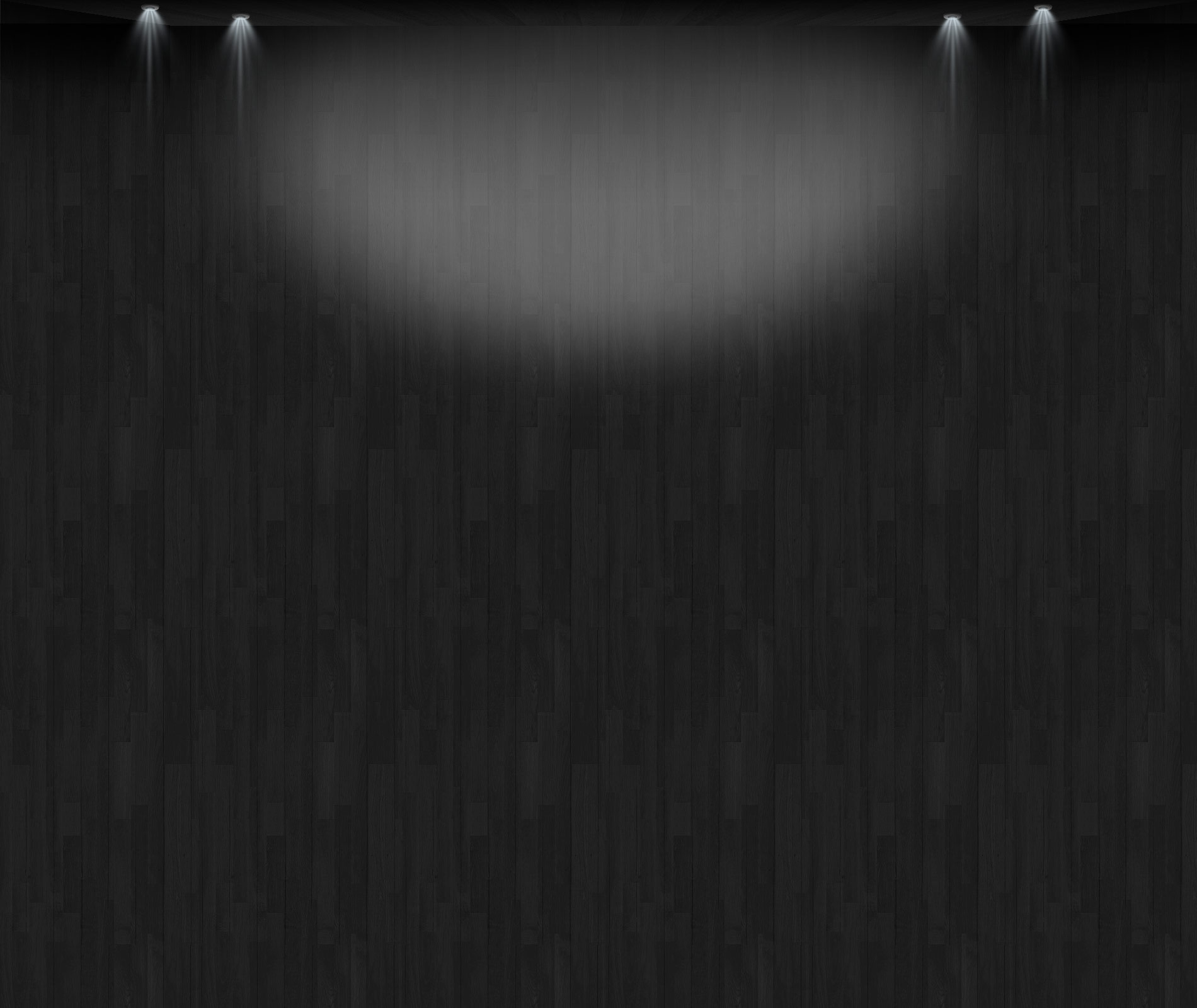 Dark wood-paneled wall with spotlights shining down, moody dim lighting